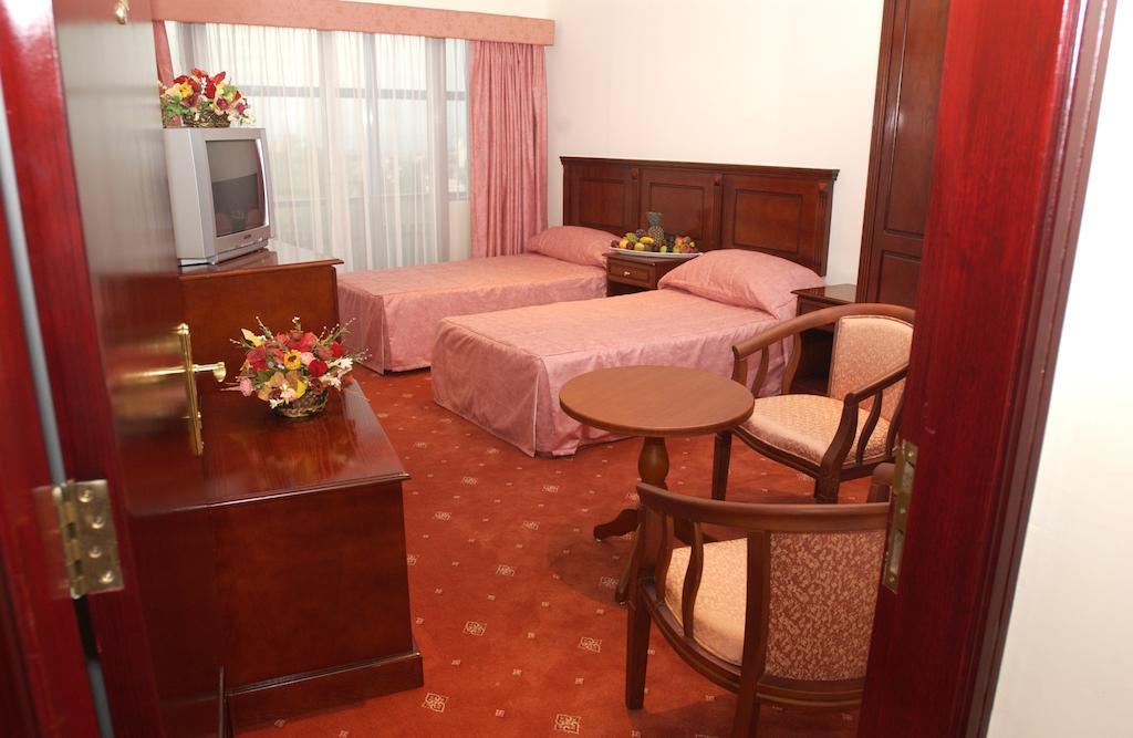 City Center Hotel Manama Oda fotoğraf